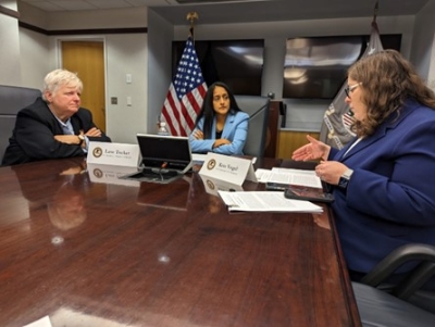 The Associate Attorney General is briefed by U.S. Attorney Lane Tucker (left) and First Assistant U.S. Attorney Kate Vogel (right) on issues affecting Alaska Native communities.