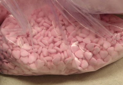Thousands of pink heart-shaped pills, believed to contain fentanyl