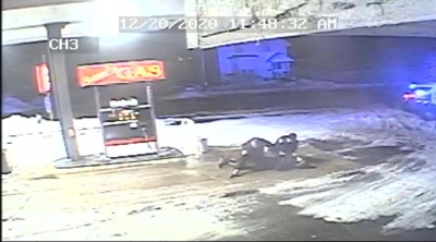 Surveillance footage still of defendant attempting to flee from law enforcement