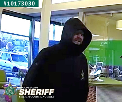 Bank robber in a black hoodie