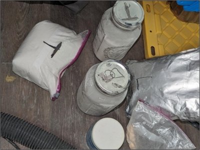 glass jars containing powder