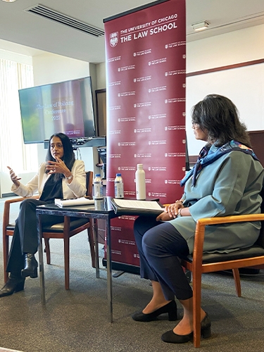 Associate Attorney General Vanita Gupta (left) speaks with University of Chicago Law Professor Sharon Fairley as part of the school’s Law of Policing Conference. 