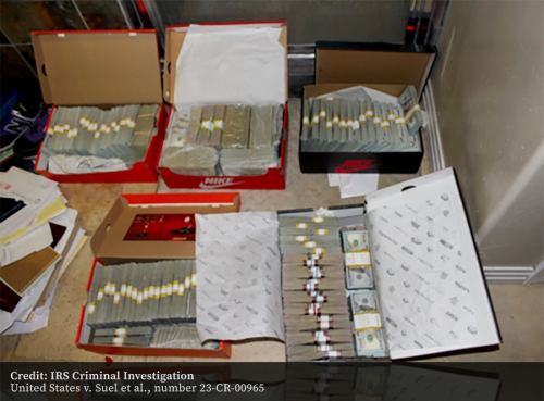 Photo of approximately $2.4 million of cash seized by law enforcement, exhibit in United States v. Suel et al. Photo of approximately $2.4 million of cash seized by law enforcement, exhibit in United States v. Suel et al.