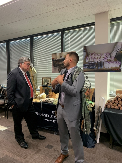 Attorney General Barr is briefed by DEA Special Agent on drug smuggling through the desert