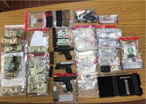 Investigators seized approximately 339 grams of suspected methamphetamine, 113 grams of fentanyl, 93 grams of heroin, and small quantities of cocaine and crack cocaine.  Investigators also seized six handguns, jewelry worth approximately $20,000, and more than $20,000 in cash.