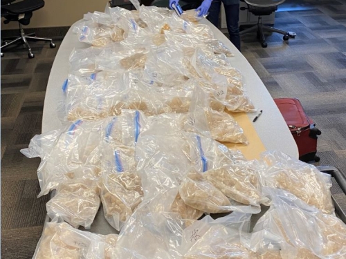 173 pounds of MDMA on a table