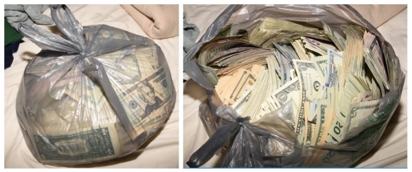 Image of a $39,000 in cash, inside a plastic shopping bag