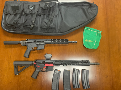 Two firearms and ammunition