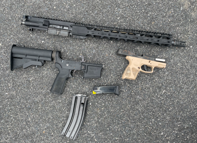 Firearms and ammunition on ground