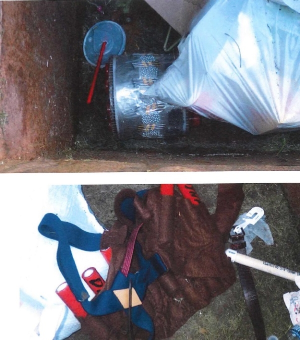 Law enforcement recovered a nail bomb and a suicide vest from the defendant's dumpster.