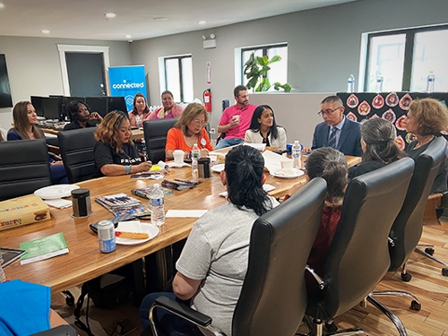 Associate Attorney General Vanita Gupta (center, right, Assistant Attorney General Amy Solomon (far right, top) listen to mothers who lost their children to gun violence.