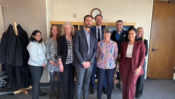 Director Rossi and ATJ team meet with Alaska Supreme Court Justices. Pictured left to right, National Legal Aid & Defender Association Vice President of Civil Programs Radhika Singh, Alaska State Court Administrator Stacey Marz, Supreme Court Justice Jennifer Henderson, Supreme Court Justice Dario Borghesan, Office for Access to Justice Senior Counsel Charlie Gillig, Supreme Court Justice Susan Carney, Manilaaq Health Center Medical Director Bob Onders, Director Rachel Rossi, Alaska