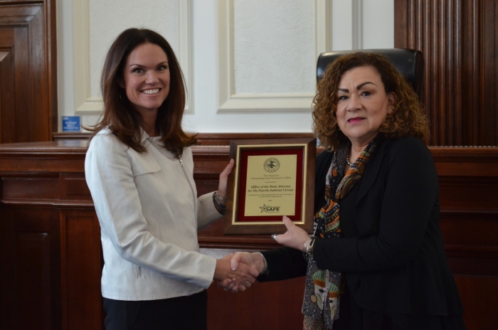 Jacksonville, Florida – Today, the Department of Justice recognized State Attorney Melissa Nelson of the Fourth Judicial Circuit for her Office’s outstanding support of the Project Safe Neighborhoods (PSN) Initiative.