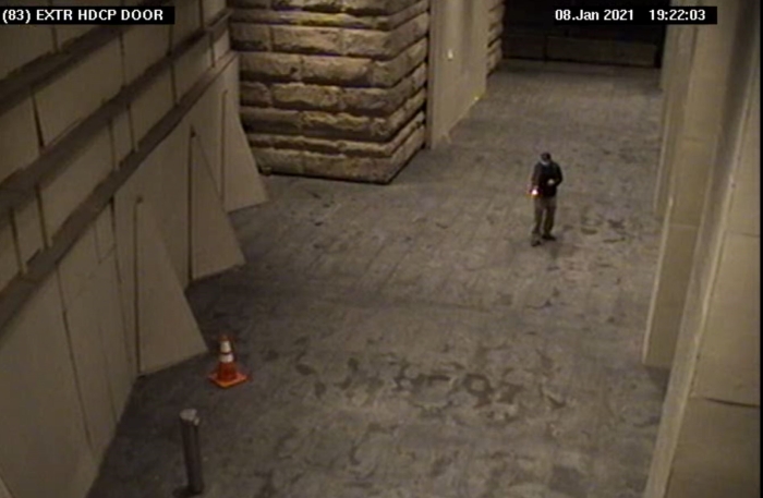 Melby discharging firearm in front of U.S. Courthouse