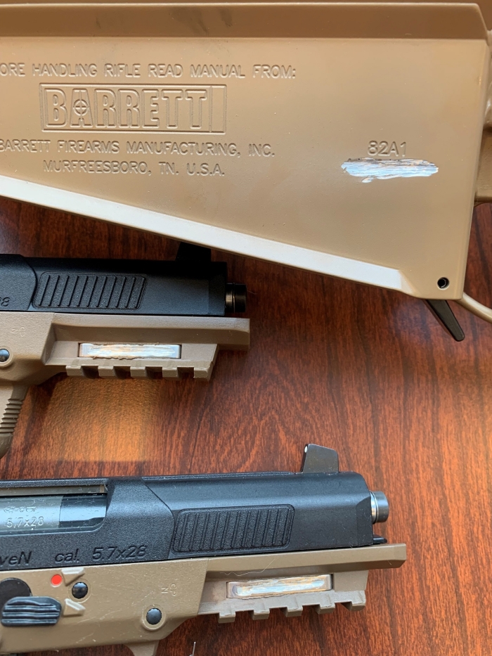 Close up of destroyed serial numbers on some of the seized firearms
