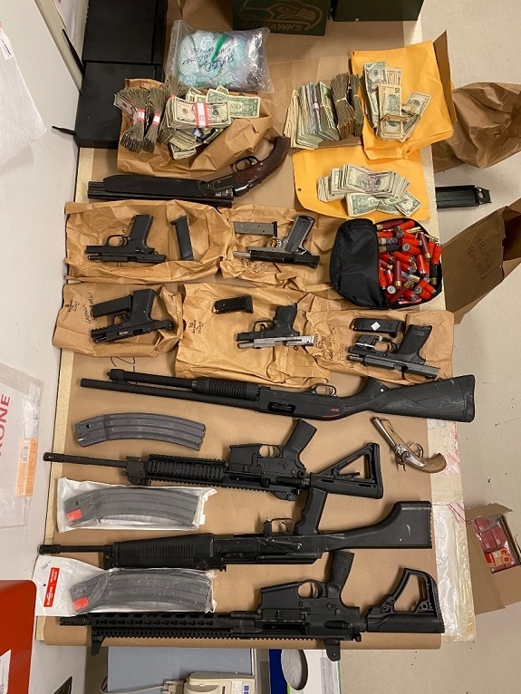 Guns and cash seized