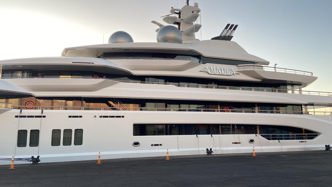 Large yacht 300-foot yacht with name "the Amadea" displayed at the top