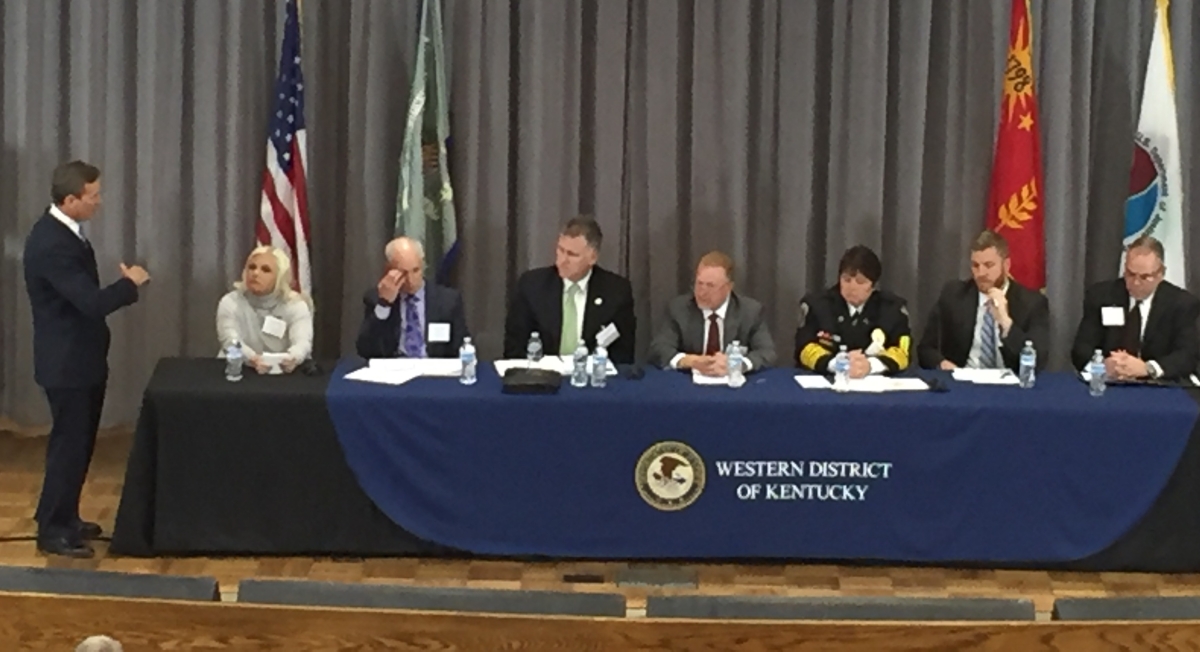 U.S. Attorney John Kuhn leads a panel discussion U.S. Attorney Kuhn leading a panel discussion