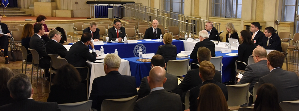 Makan Delrahim (center), Antitrust Division staff, Roundtable Participants, and members of the public participating in the Public Roundtable Discussion Series on Deregulation & Antitrust Law in the Great Hall of the Main Justice Building Makan Delrahim (center), Antitrust Division staff, Roundtable Participants, and members of the public participating in the Public Roundtable Discussion Series on Deregulation & Antitrust Law in the Great Hall of the Main Justice Building