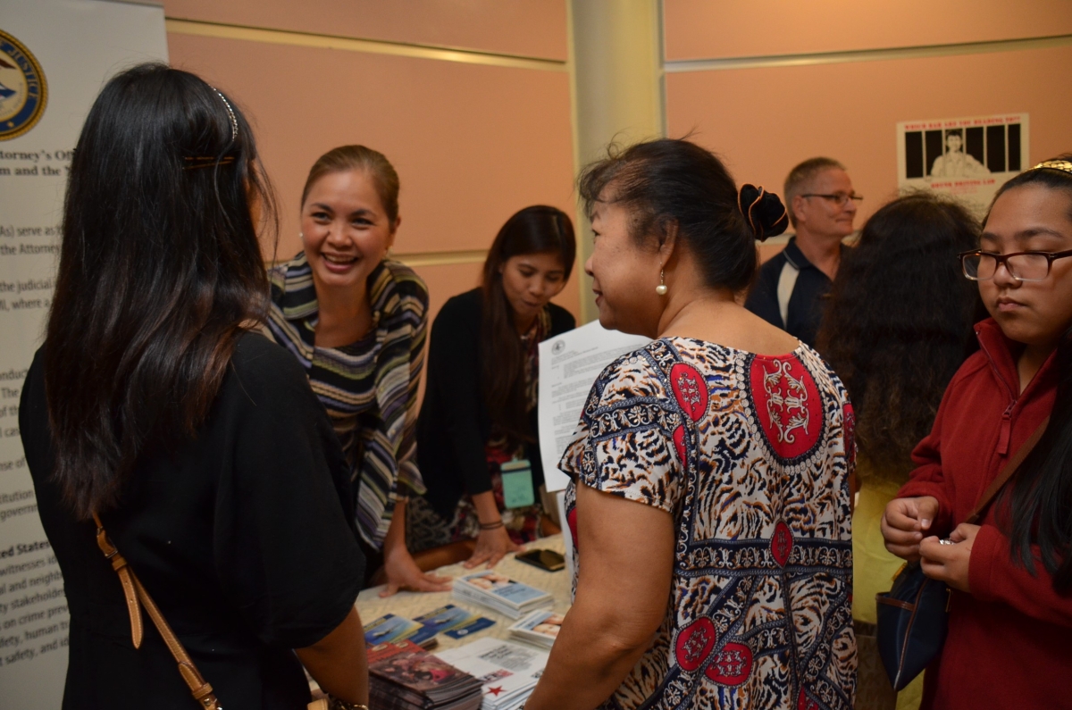 U.S. Attorney Alicia Limtiaco, second from left, responds to a question from visitors receiving handouts from the U.S. Attorney’s Office Picture of U.S. Attorney Alicia Limtiaco, second from left, responds to a question from visitors receiving handouts from the U.S. Attorney’s Office