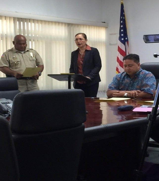 Picture of U.S. Attorney Alicia Limtiaco with NMI Department of Public Safety Commissioner Robert Guerrero and Governor of the NMI Ralph Torres at the Proclamation Signing for National Community Policing Week