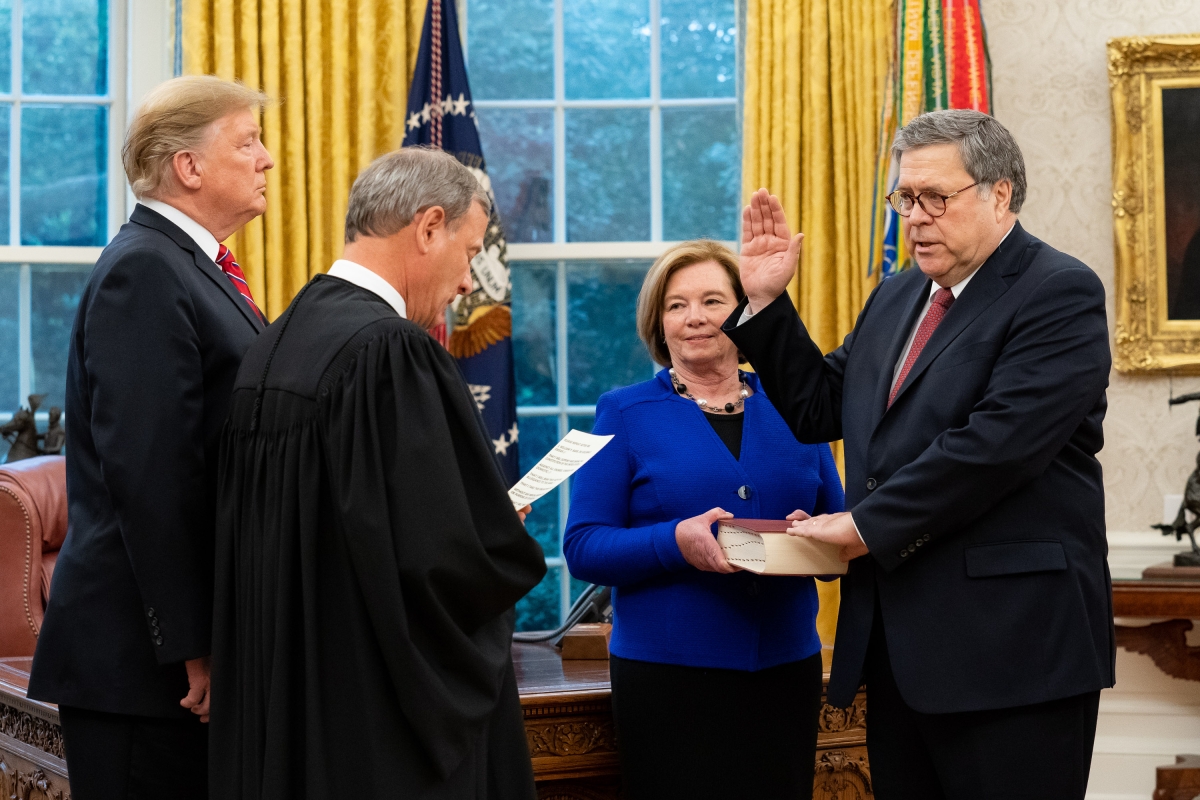 President Donald J. Trump participates in swearing-in of William P. Barr administered by U.S. Supreme Court Chief Justice John Roberts on February 14, 2019.  Attorney General Barr's wife, Christine, holds the Bible.