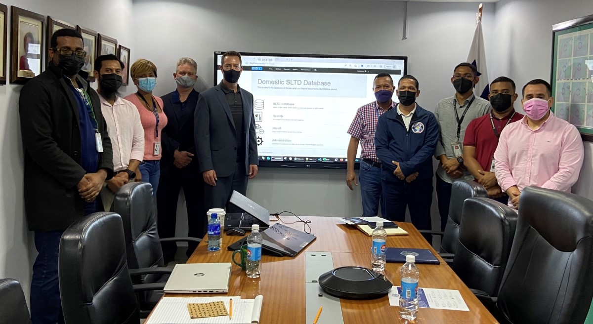 A photo of people in a conference room A photo of people in a conference room
