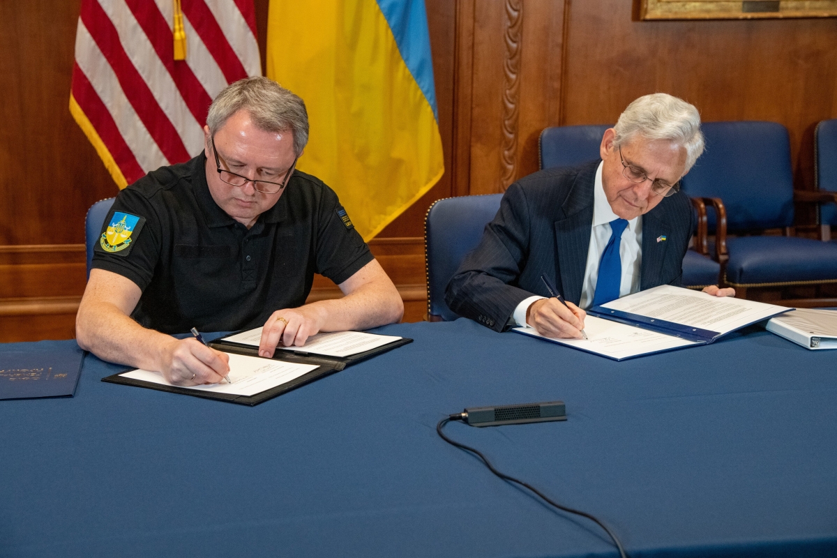 U.S. Attorney General Merrick B. Garland and Ukranian Prosecutor General Andriy Kostin signing a memorandum of understanding. U.S. Attorney General Merrick B. Garland and Ukranian Prosecutor General Andriy Kostin signing a memorandum of understanding.