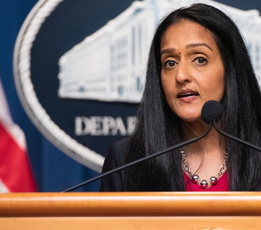 ASG Vanita Gupta at podium
