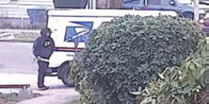 suspect approaches mail truck