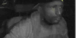 Screenshot of in-car camera video capturing carjacker's image.