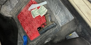 Firearm and cash evidence