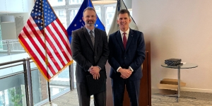 AUSA McGrath stands next to Acting U.S. Attorney John E. Childress