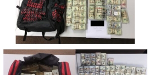 red and black duffle bags full of money