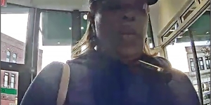Surveillance footage from ATM allegedly showing defendant wearing an I Voted sticker on Nov. 5, 2024