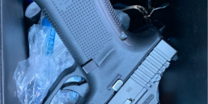 Gun on top of fentanyl pills