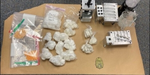 Suspected fentanyl, cocaine, pills, small finger press and other drug paraphernalia sized on July 10, 2025 