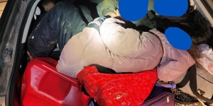 People in a trunk of a car
