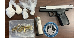Photo of the firearm, ammunition, and fentanyl found on Gomes