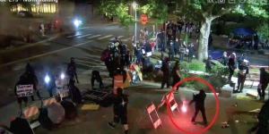 Defendant throwing lit flare