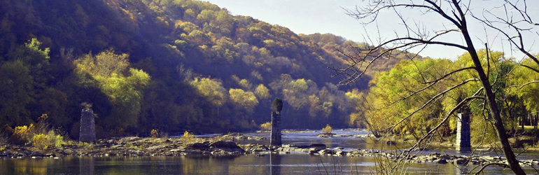 A rivers flows through Harpers Ferry. Courtesy of Ned Wolff (DOJ)