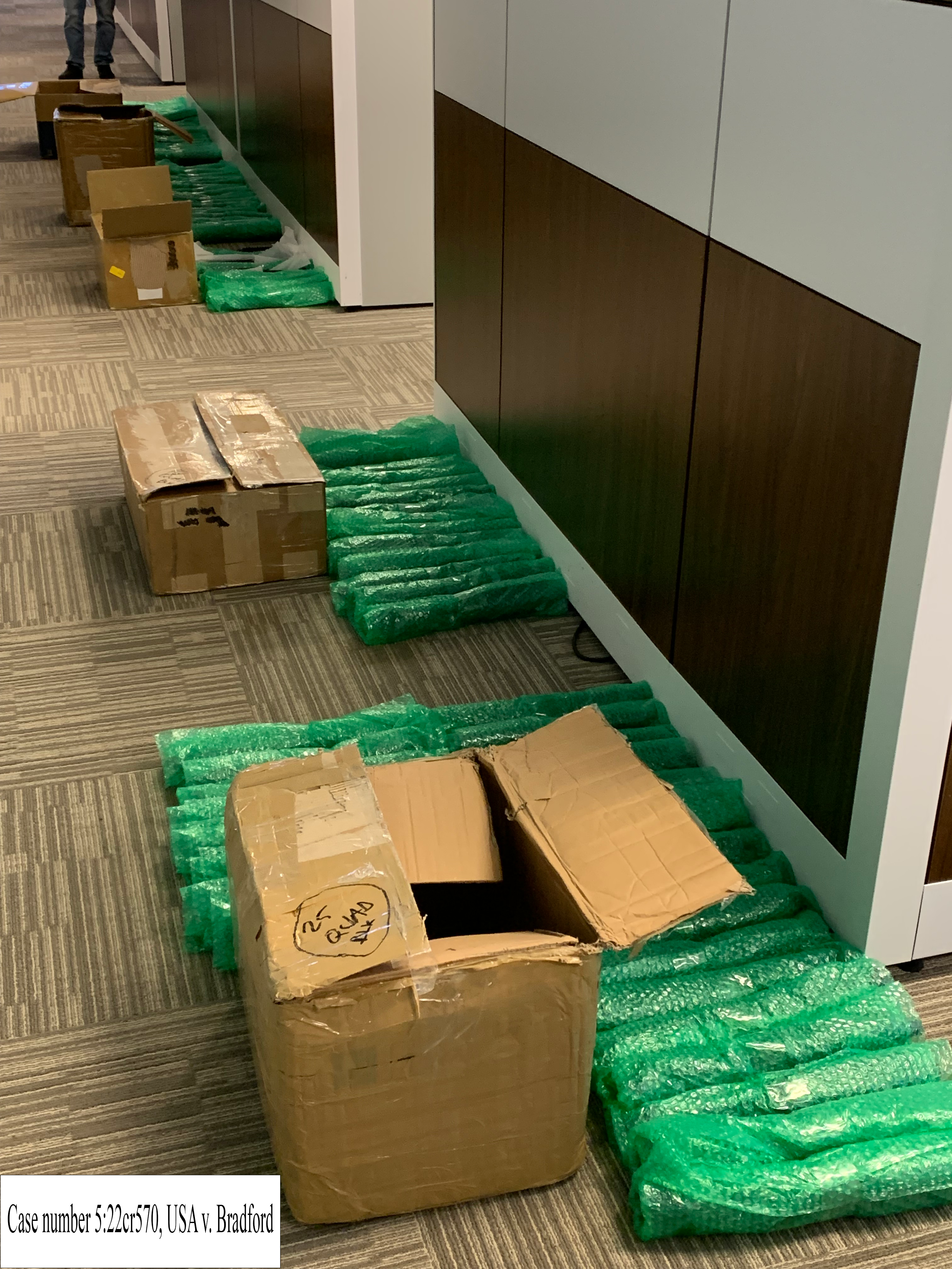 seized boxes of gun parts