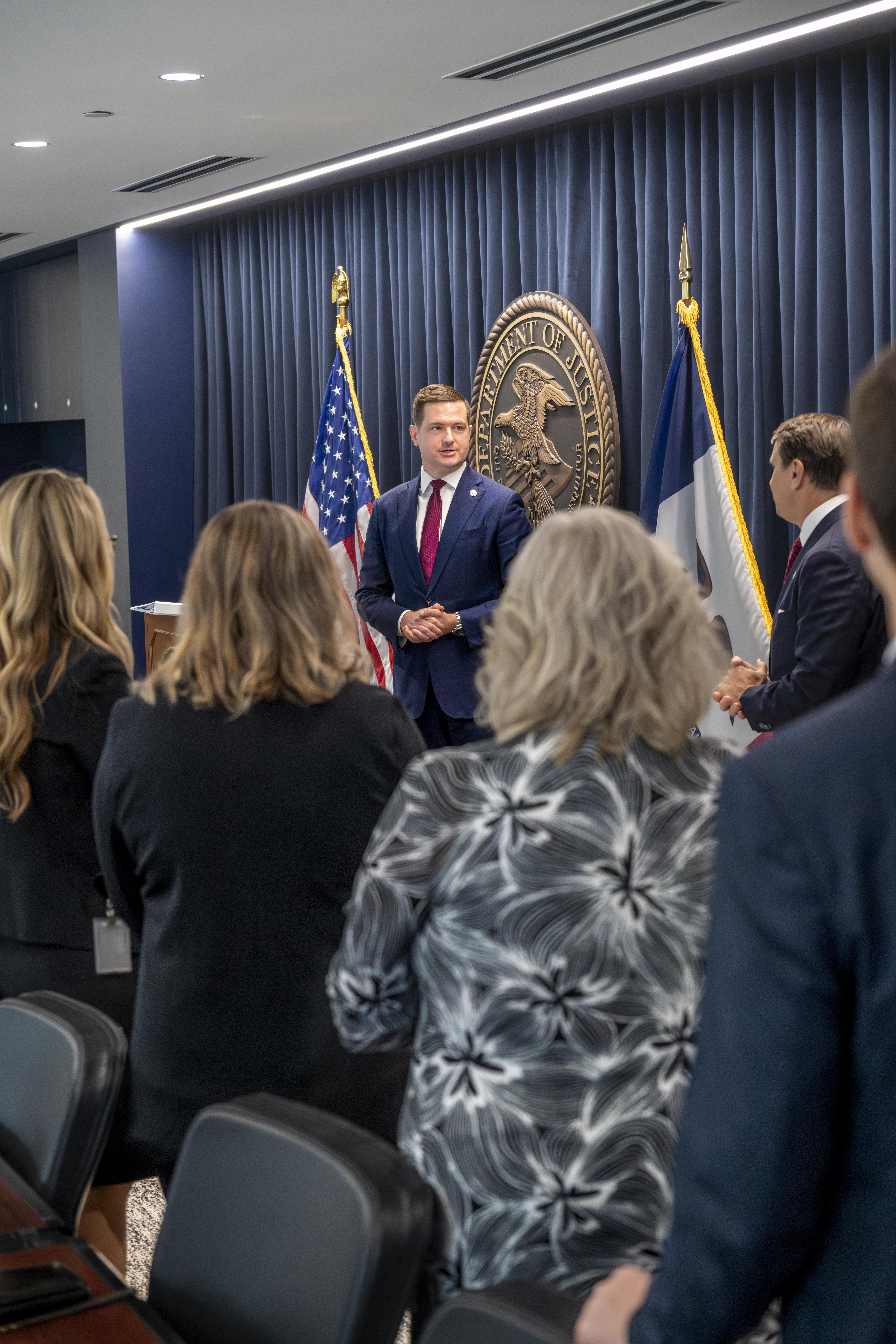 U.S. Attorney David C. Waterman introduces Attorney General Todd Blanche at a meeting on August 20, 2026.