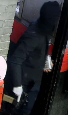 Surveillance photo taken the day of the tire store robbery.
