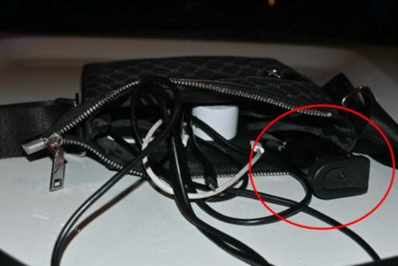 black bag with gun and gun clip