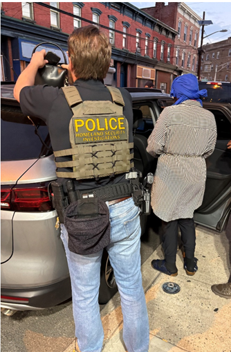 Detainee with officer