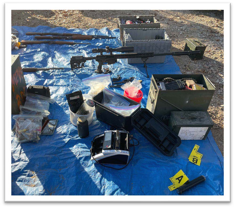 Firearms, ammunition, silencer and cash counter found on property