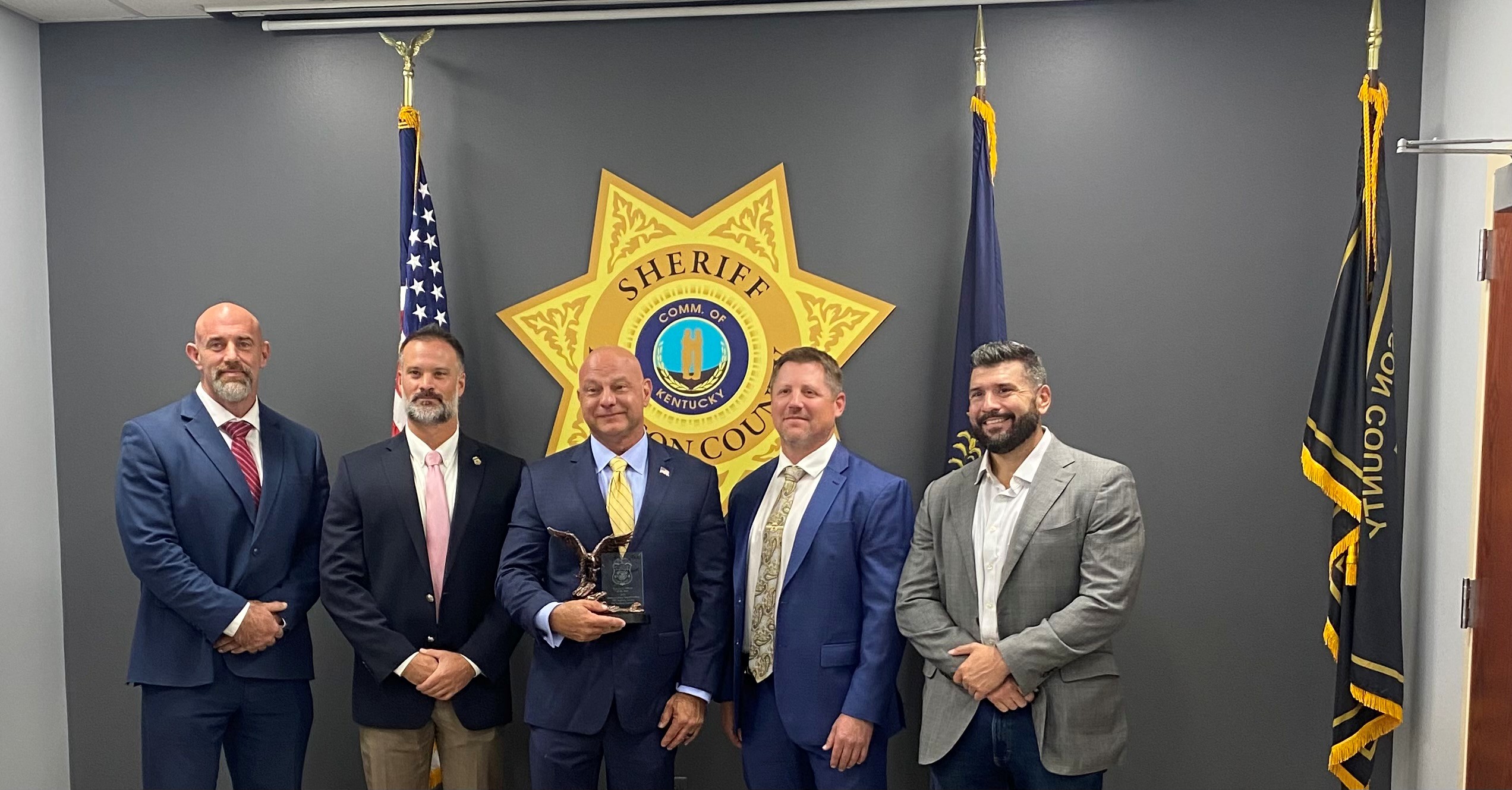 HSI and Madison County Sheriff's Office staff, alongside USA Parman and TFO Gatson