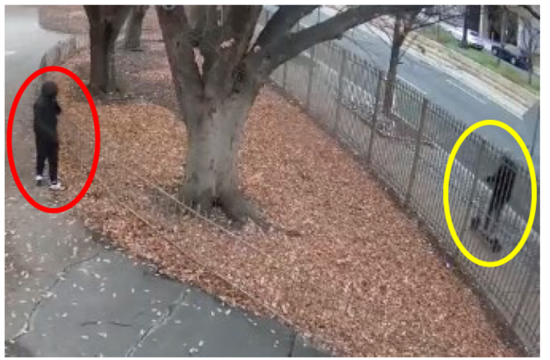 Surveillance photo shows Welch (circled in red) and the scooter rider (circled in yellow).
