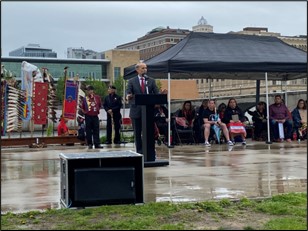 U.S. Attorney Mark Totten standing at a podium speaking at the MMIP Awareness Day Event